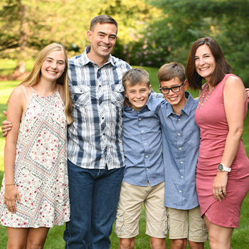 Chris Banweg posing with his family